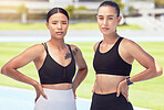 Fitness, workout and exercise friends outdoor on a sports track, stadium or arena with healthy body. Women with motivation and focus after cardio training and looking strong, wellness and slim 