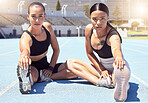 Fitness, stadium and women stretching hamstring on racetrack ready to start training, exercise and cardio workout. Wellness, girls and portrait of healthy runners at a sports competition in summer