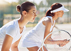 Sports game, tennis team and women training for professional competition together, focus on court and ready for teamwork goal in match. Athlete people with concentration during outdoor sport event 