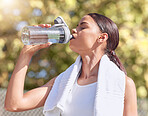 Woman, exercise and drink water outside, while running or training in the summer. Lady, workout and bottle for hydration in the sun, runner in park with towel for health, wellness and beauty