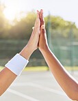 Hands, high five and people on a tennis court with motivation, success and partnership. Closeup of support, unity and diverse friends on a field for team building, training or sports match win.