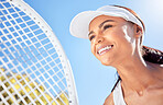 Sport, fitness and portrait of tennis woman with racket, smile or motivation with training, exercise or health workout. Happy, mindset or wellness coach smiling with energy or thinking of sports goal