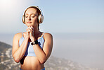 Relax, meditation and yoga with headphones music for calm and wellness mindset for fitness exercise. Thinking, zen and mindfulness woman spiritual preparation for meditating workout in nature.