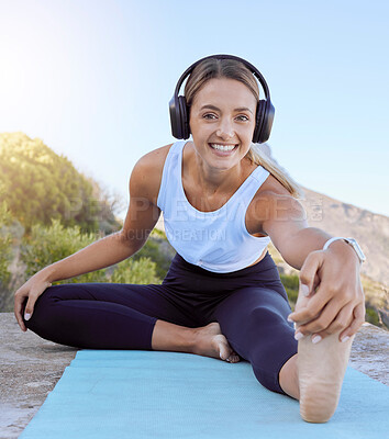 Buy stock photo Workout yoga stretch, music streaming headphones and woman outdoor on a mat. Portrait of a happy smile from female wellness, exercise and healthy stretching before training in nature on a mountain 