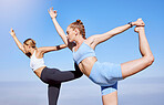 Stretching, balance and yoga women on blue sky mockup and lens flare for wellness, body health and fitness lifestyle. Personal trainer or professional sports people with pilates training outdoor