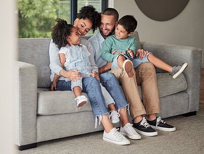 Buy stock photo Happy family relax on home sofa in Brazil, parents smile at children on casual day together. Lounge in living room, young african kids bond with black mother and funny father make dad jokes on couch
