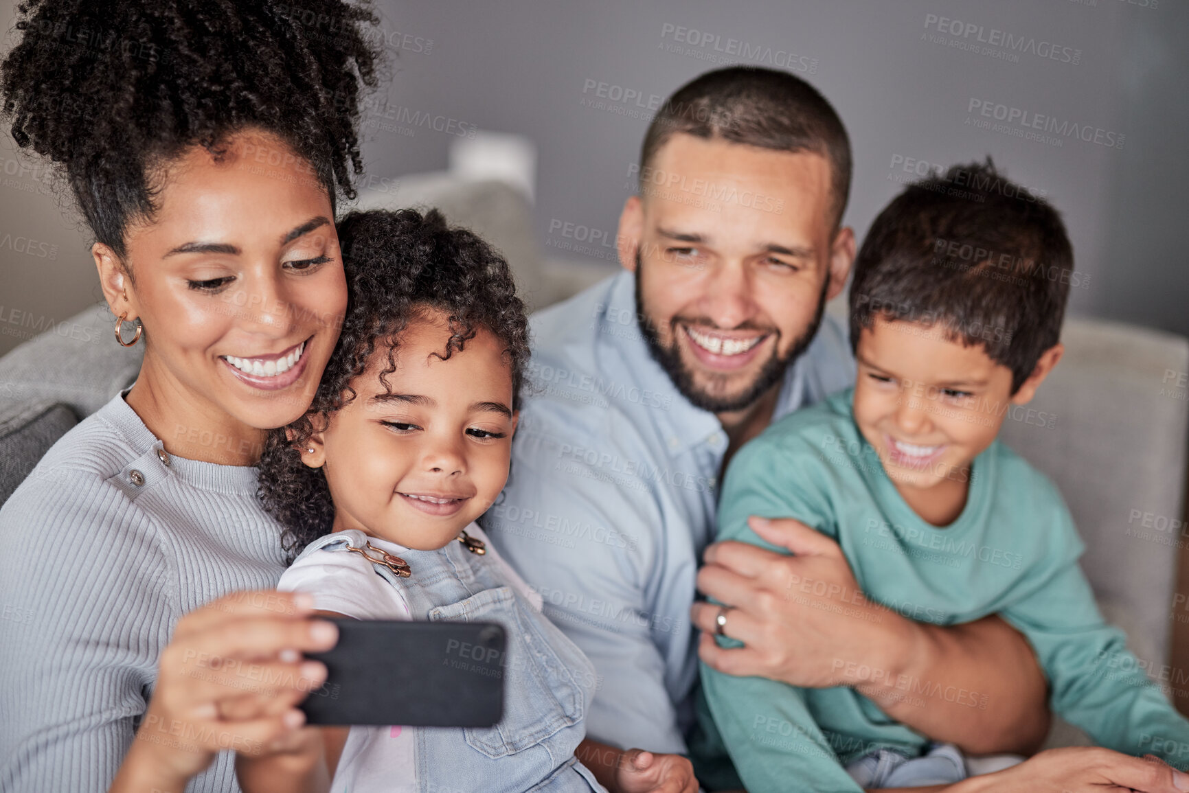 Buy stock photo Family selfie, live streaming phone and smile on the internet with technology, happy for mobile app and record video for web on the sofa in living room. Latino mother and father take photo with kids