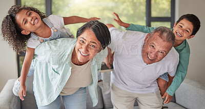 Buy stock photo Family, kids and piggy back with grandparents, fun and smiling in living room. Grandma and grandpa spending quality time with children on weekend. Happy senior man and woman playing with boy and girl