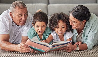 Buy stock photo Family, book and children reading development growth at home with grandparents on the floor. Kids, elderly and happy people looking at books, story and pictures encourage fun learning and studying