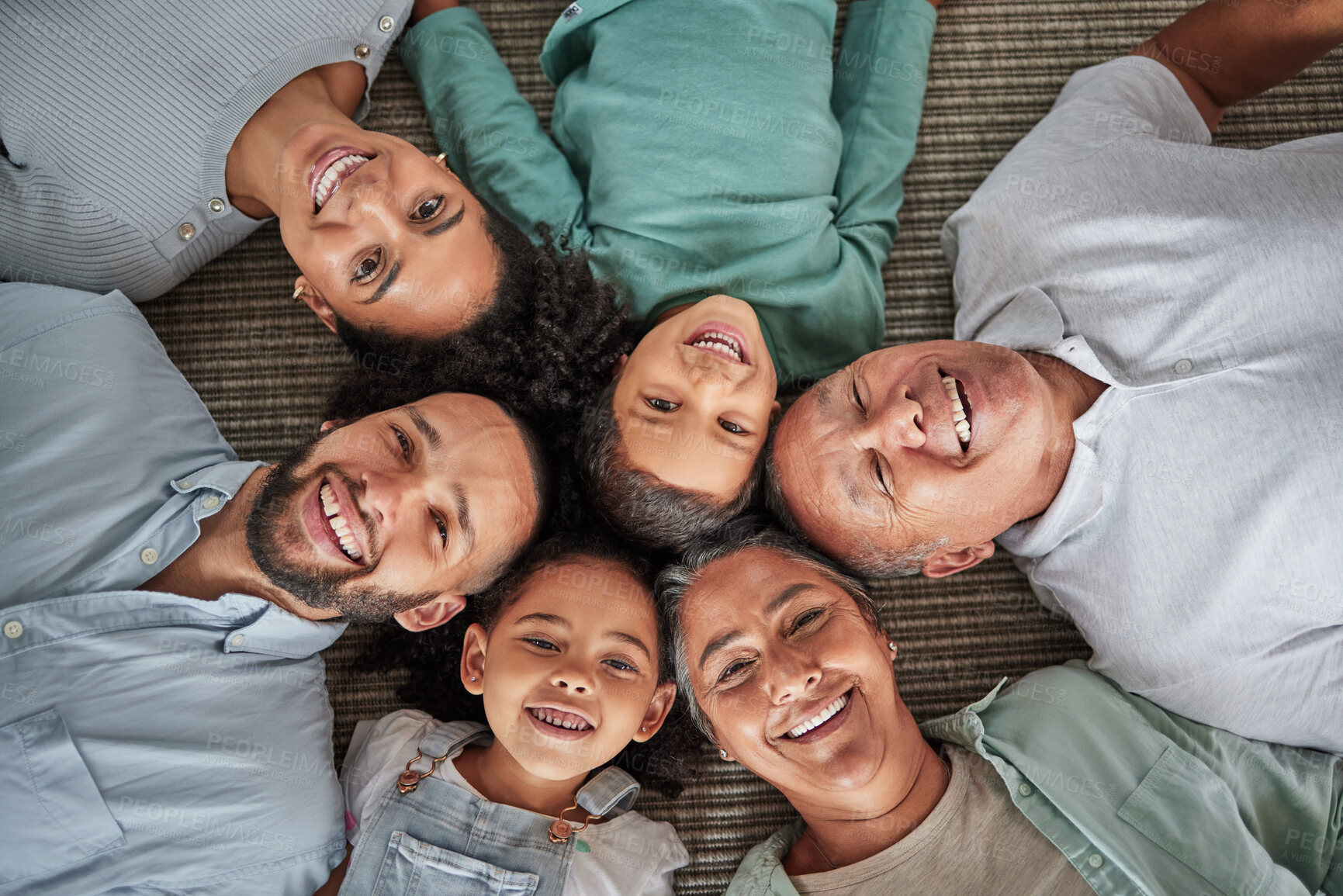 Buy stock photo Family floor, happy portrait and grandparents in retirement with children, crazy and comedy together in the living room of home. Kids and parents with smile for weekend with elderly people in house