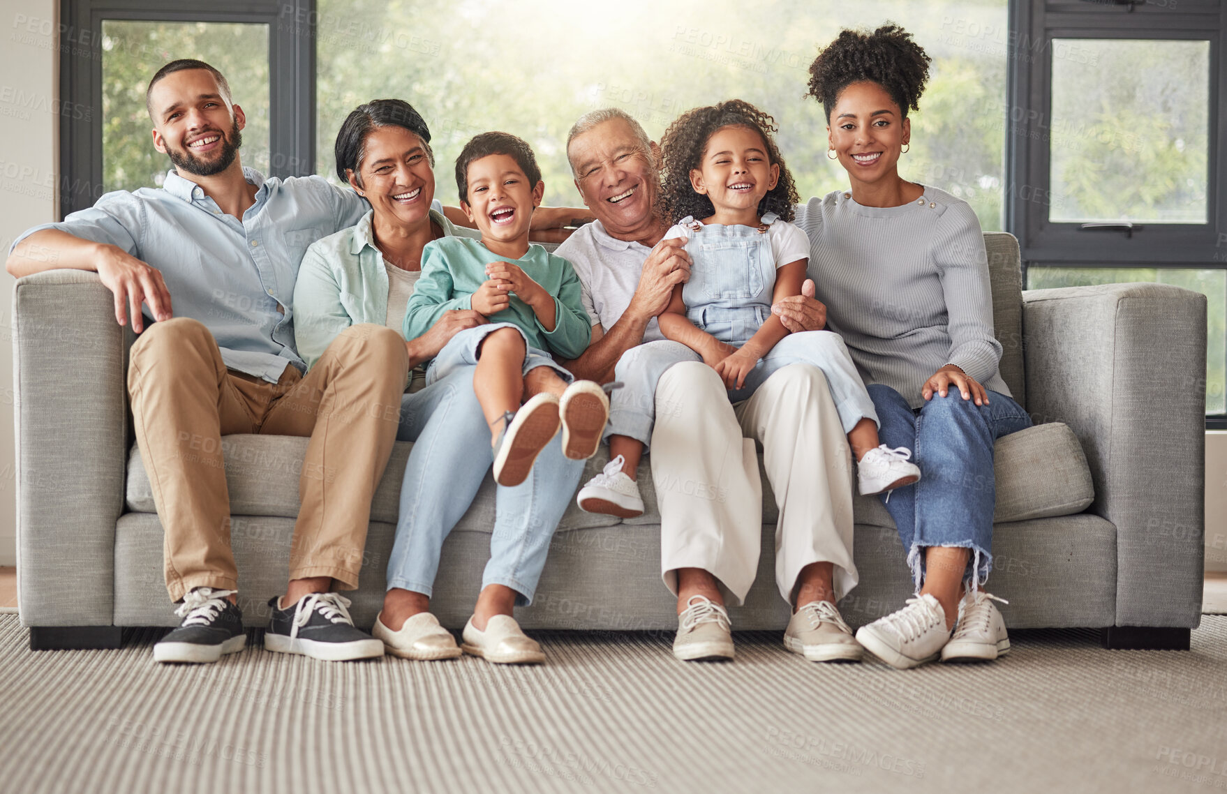 Buy stock photo Portrait of happy big family relax on sofa during annual reunion with grandparents, parents and children. Love bond, fun and Brazil people lounge on living room couch and enjoy quality time together