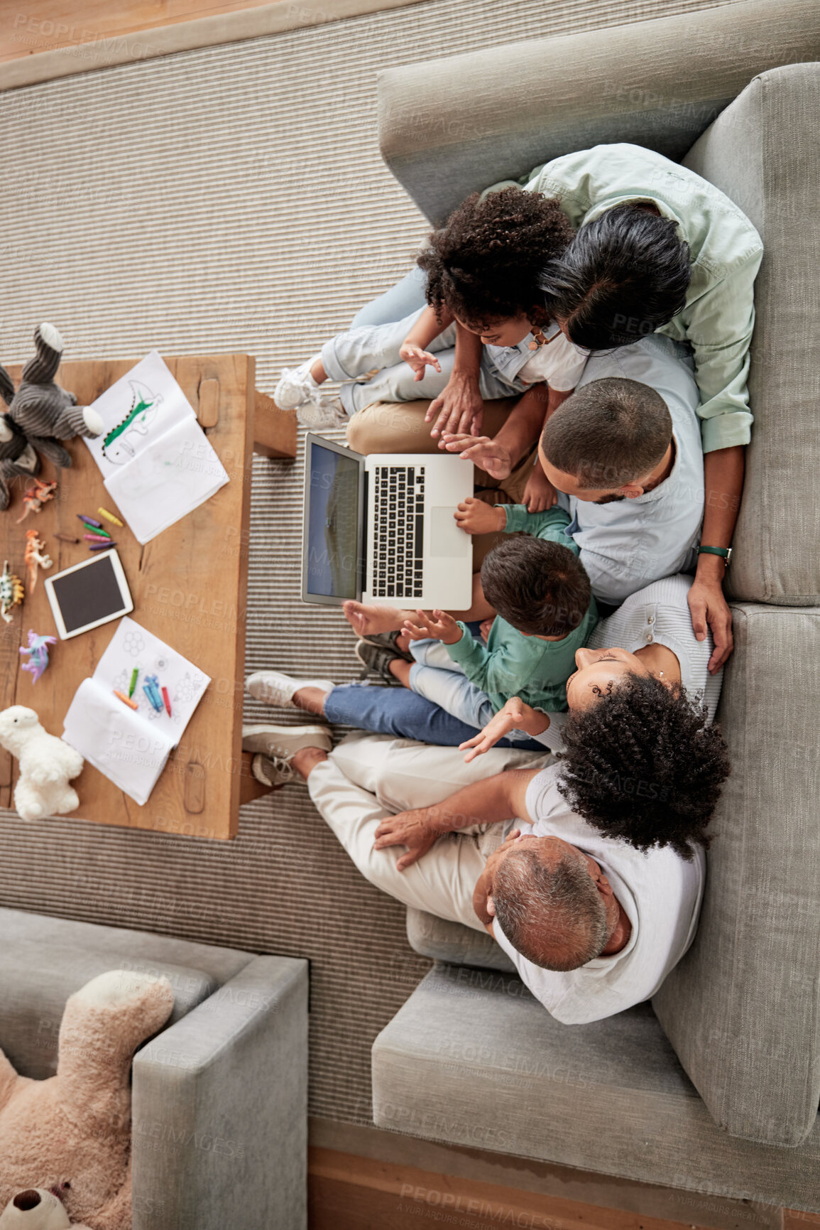 Buy stock photo Family, children and video call with kids, parents and grandparents using a laptop on the sofa at home. Communication, wave and internet with a girl, boy and relatives in a living room from above