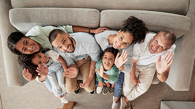 Buy stock photo Family, children and wave with a portrait of kids, grandparents and parents sitting on a sofa in the living room of their home from above. Happy, smile and love with a senior man, woman and relatives