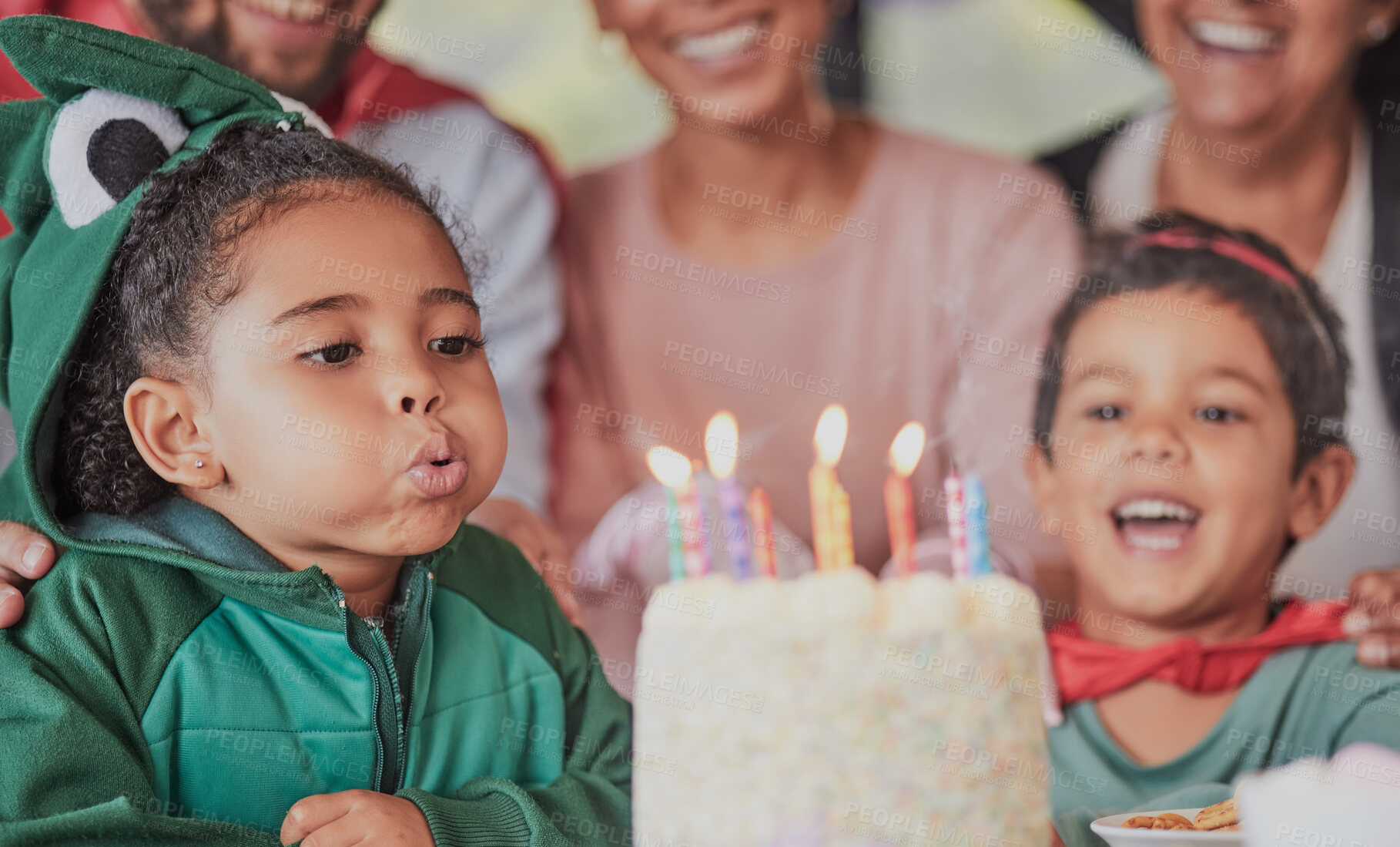 Buy stock photo Birthday, party and happy family with girl and candle on cake for celebration, gift and announcement. Wow, support and costume with children and parents at home for surprise, event and dessert