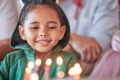 Buy stock photo Birthday, party and birthday cake with girl looking happy and excited to blow candles in celebration of her social day. Family, children and a cheerful black child smile, sweet and ready for a snack