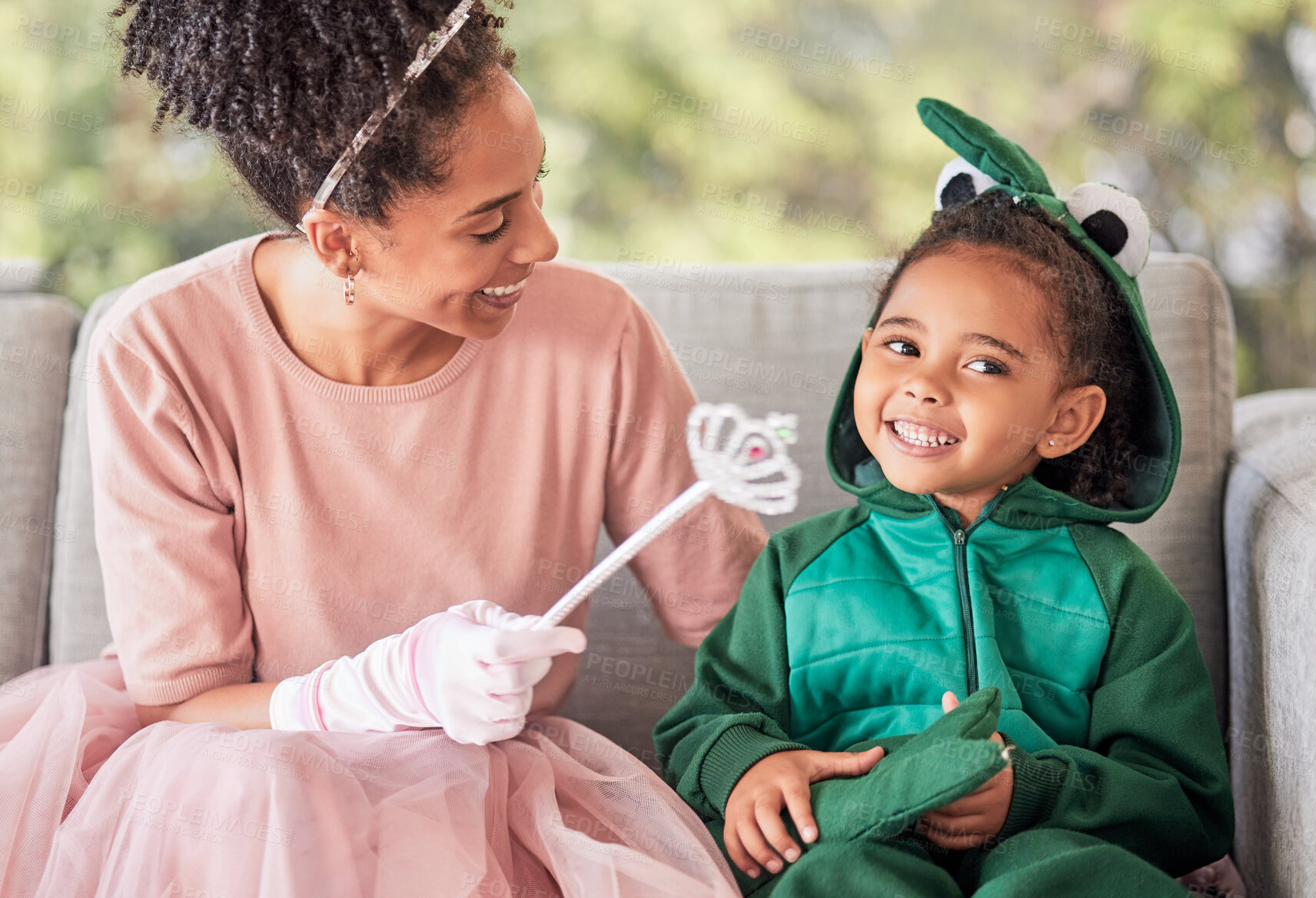 Buy stock photo Love, family costume and smile on happy girl, child or kid playing dress up, having fun and bonding with mother. Happiness, princess mom and dinosaur child enjoy quality time together for Halloween