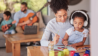Buy stock photo Creative family, mom and girl doing art and craft with dad and in background with guitar in home. Painting, child development and parents love for children, a mother from brazil and kid with paint.
