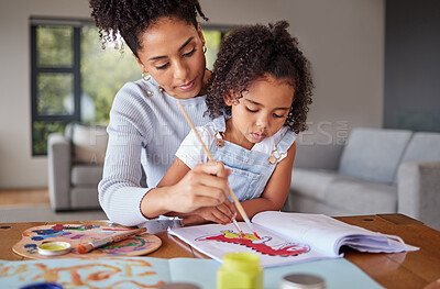 Buy stock photo Creative, art and painting with mom and girl in living room for education, love and family. Learning, kindergarten and happy with brazil mother and child with paint and color on paper for drawing 