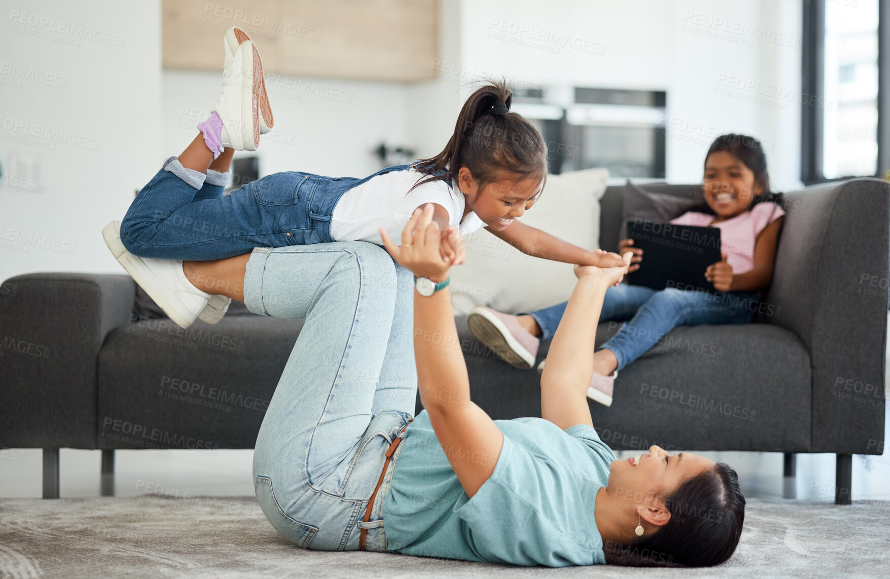 Buy stock photo Family flying, helicopter game and mother being funny with children in house living room, care on the floor and smile for love in the lounge of home. Happy girl playing with her mom together