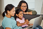 Family, children and laptop with a girl, mother and grandmother streaming an online subscription service in the house. Love, computer and visit with a senior woman, daughter and granddaughter at home
