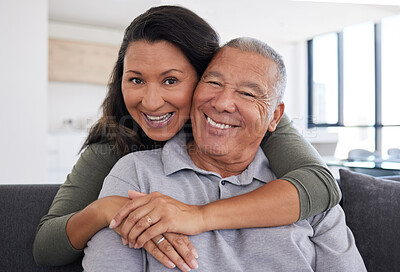 Buy stock photo Retirement, love and hug with couple on sofa in together enjoying happy, relax and support. Smile, family and trust with portrait of man and woman sitting in living room for wellness, health or peace