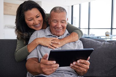 Buy stock photo Senior couple use mobile tablet technology, video call family and communicate with friends on sofa from home. Happy elderly grandparents relax, watch funny content online and love life in retirement 