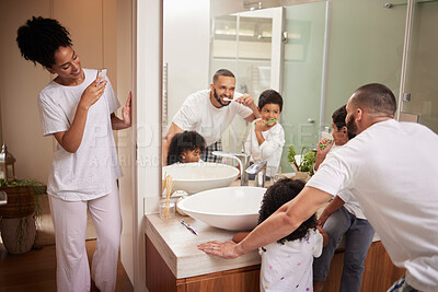 Buy stock photo Kids and dad brushing teeth in bathroom, reflection in mirror and mom with phone taking picture at bedtime. Love, happy family and man and children with toothbrush and woman with smartphone in home.