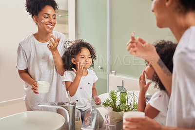 Buy stock photo Family, skincare and love with mom and girl with facial product in bathroom mirror together for beauty, cosmetics or luxury. Wellness, happy and morning with Brazil mother and child with face cream 