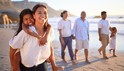 Buy stock photo Travel, happy family and beach vacation with relax, cheerful people bonding along the sea at sunset. Love, nature and excited girl embracing her mother, enjoying freedom and fresh air with family