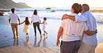 Relax, travel and happy with big family at the beach walking on Bali vacation together for summer, nature and love. Ocean, support and holding hands with parents, grandparents and kids on holiday