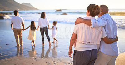 Buy stock photo Relax, travel and happy with big family at the beach walking on Bali vacation together for summer, nature and love. Ocean, support and holding hands with parents, grandparents and kids on holiday