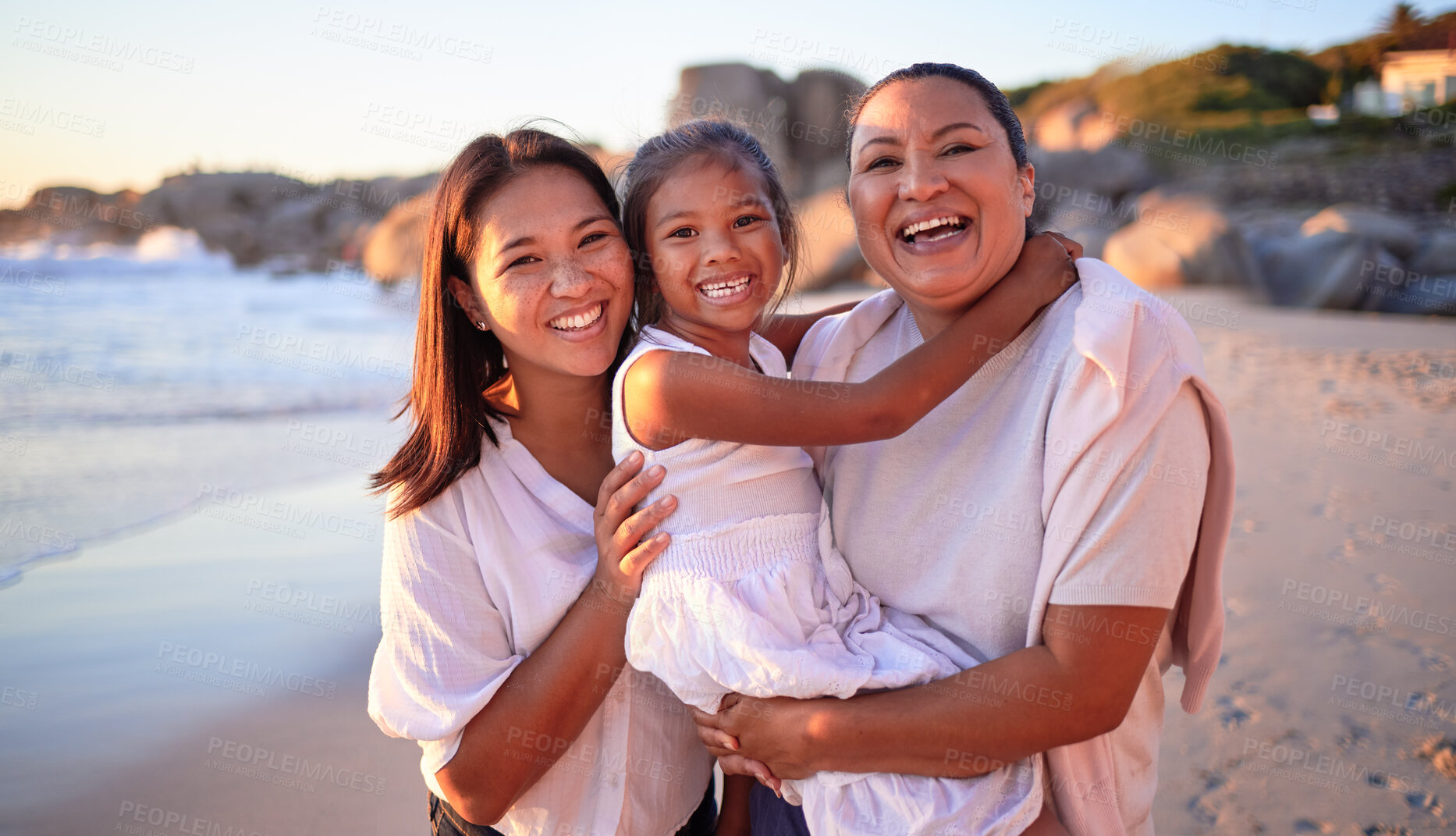 Buy stock photo Family, love and children with a girl, mother and grandmother on the beach for summer vacation. Portrait, travel and nature with a senior woman, daughter and granddaughter by sea or ocean in malaysia