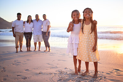 Buy stock photo Children, beach and family with a girl and sister by the ocean or sea at sunset during summer vacation. Kids, love and travel with daughter siblings on holiday with their parents and grandparents