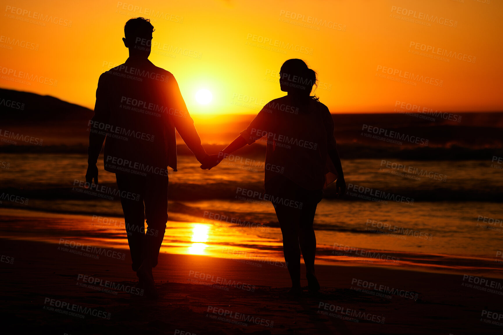 Buy stock photo Ocean sunset, couple walking and beach water at night or woman and man love holding hands at sea summer vacation. Travel together, honeymoon silhouette and bonding on holiday sky sunlight in nature