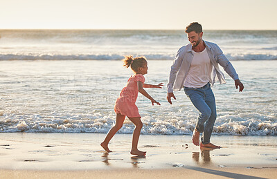 Buy stock photo Child and father on beach running in ocean together together for body movement wellness, exercise and healthy development. Dad having fun and playing with girl kid at sea ocean outdoor summer holiday