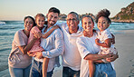 Big family, happy and beach portrait of people with girl children by the sea at sunset. Happiness of a summer vacation with kids spending quality time together on the ocean water waves and sand
