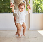 Development, walking and baby learning with mother helping support her childs growth, progress and first steps. Smile, happy and parent holding hands with her kid teaching her excited son to stand 