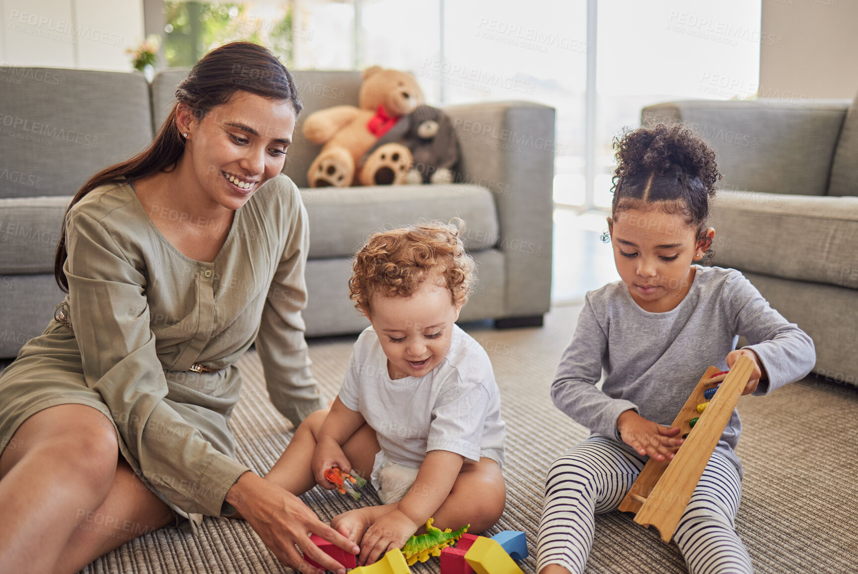 Buy stock photo Family, mother and children playing with toys for development, education and childcare creative learning. Happy mom teaching and developing foster brother and sister siblings at home on a weekend