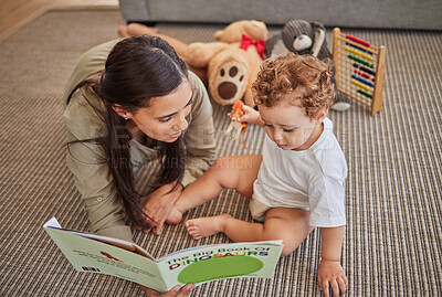 Buy stock photo Mother, baby and book for story for education on carpet in home, for learning and reading skills. Child, mom and teaching with storybook for development of mind, brain or thinking ability in house