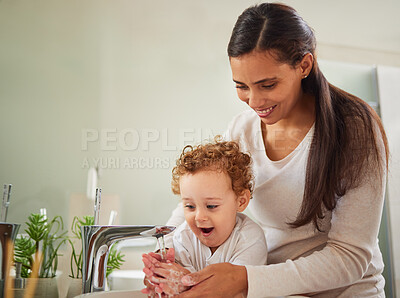 Buy stock photo Mother, boy and washing hands help in water as fun covid bacteria cleaning and morning house hygiene wellness. Mom, woman or parent and child by bathroom sink in Italy home safety healthcare skincare