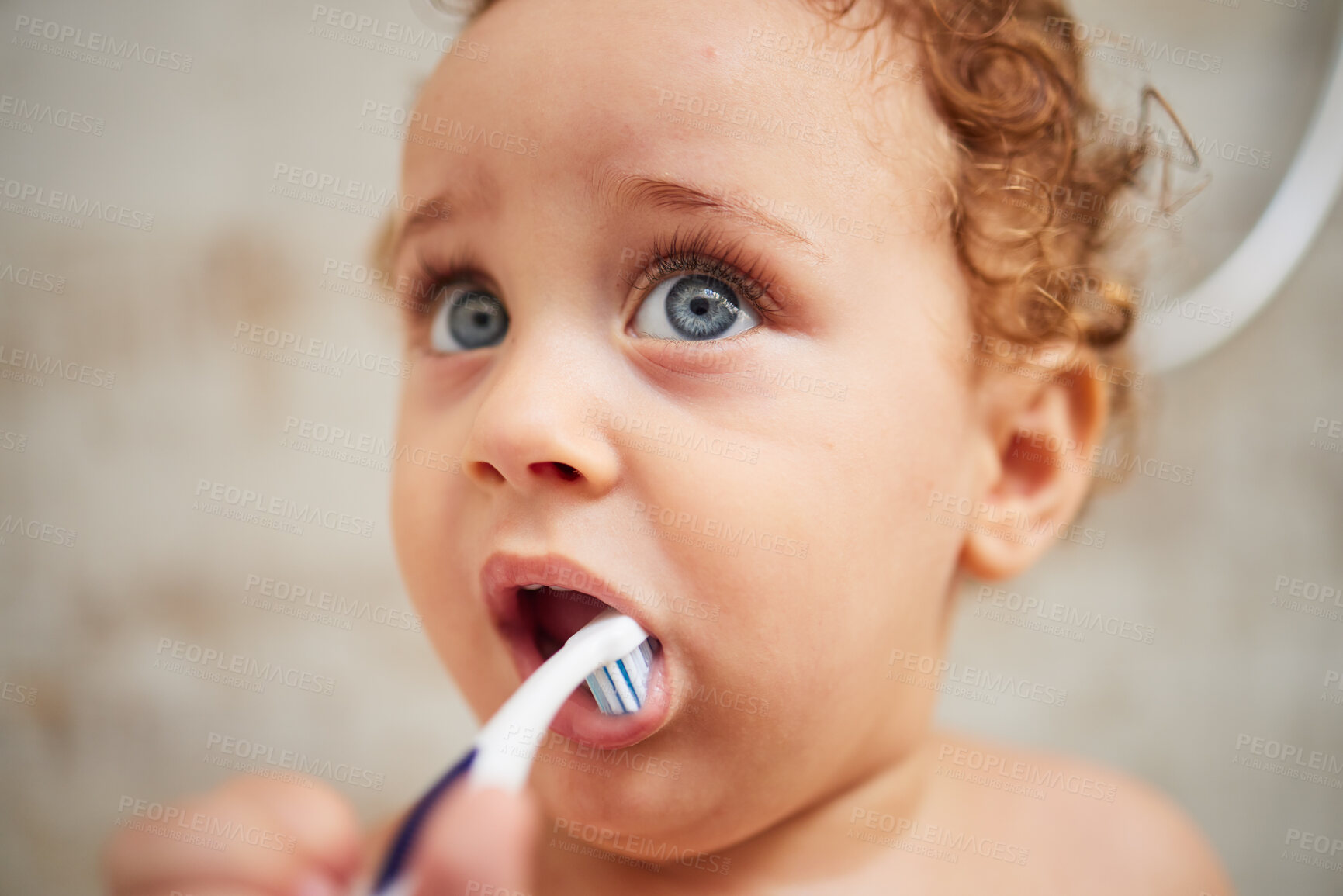 Buy stock photo Dental, health and oral hygiene by baby brushing his teeth in a bathroom, grooming and child development. Cleaning, learning and child having fun with daily habit for mouth care with toothbrush
