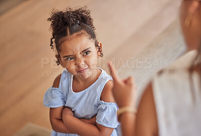Buy stock photo Angry child and tantrum discipline conflict for attitude problem in home with stressed mother. Young girl frustrated, unhappy and moody at disappointed adult punishment for negative behaviour.
