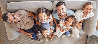 Buy stock photo Happy big family, smile on sofa and top view of generations, grandparents and parents spend time together in living room. Love, diversity and couple with girl kids, grandma and grandpa relax at home.