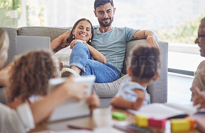 Buy stock photo Family, children and parents love with a mother and father watching the kids while learning or playing in the living room. Happy, home and relax with a man and woman on a sofa in their home to relax