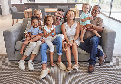 Buy stock photo Big family, portrait and happy smile relax on sofa enjoying bonding time together in the living room at home. Mother, father and children with their grandparents relaxing on couch in happiness