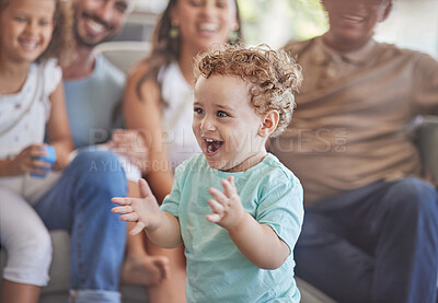 Buy stock photo Baby, clapping hands and excited toddler boy feeling happy, playful and cheerful at home with his family showing growth, development and having fun. Cute child playing in his new Zealand house
