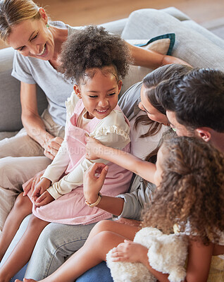 Buy stock photo Relax, love and big family with adoption children bonding with parents and grandmother in home. Happy black kids resting with caucasian dad and mom together on living room sofa in house.
