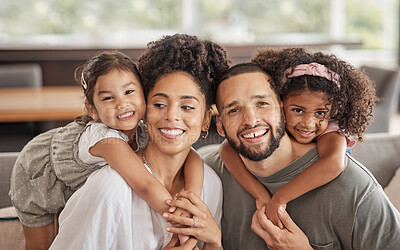 Buy stock photo Portrait of family, smile and love while relax together on a sofa at home. Carefree playful little children or girl hug arms around loving parent. Happy kids bonding with mom and dad on sofa or couch