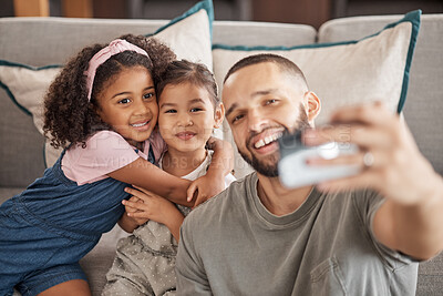 Buy stock photo Happy, smile and family selfie of a father and children relax on living room sofa while bonding, having fun and enjoy quality time together. Love, peace and happiness for dad and kids from Brazil