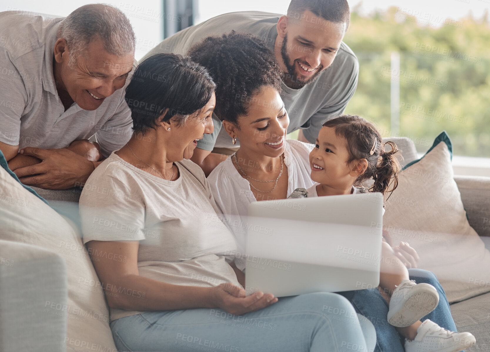 Buy stock photo Happy, laptop and big family streaming a movie, relaxing and bonding together on the weekend at home. Child, grandparents and mother with father watching movies on online entertainment subscription